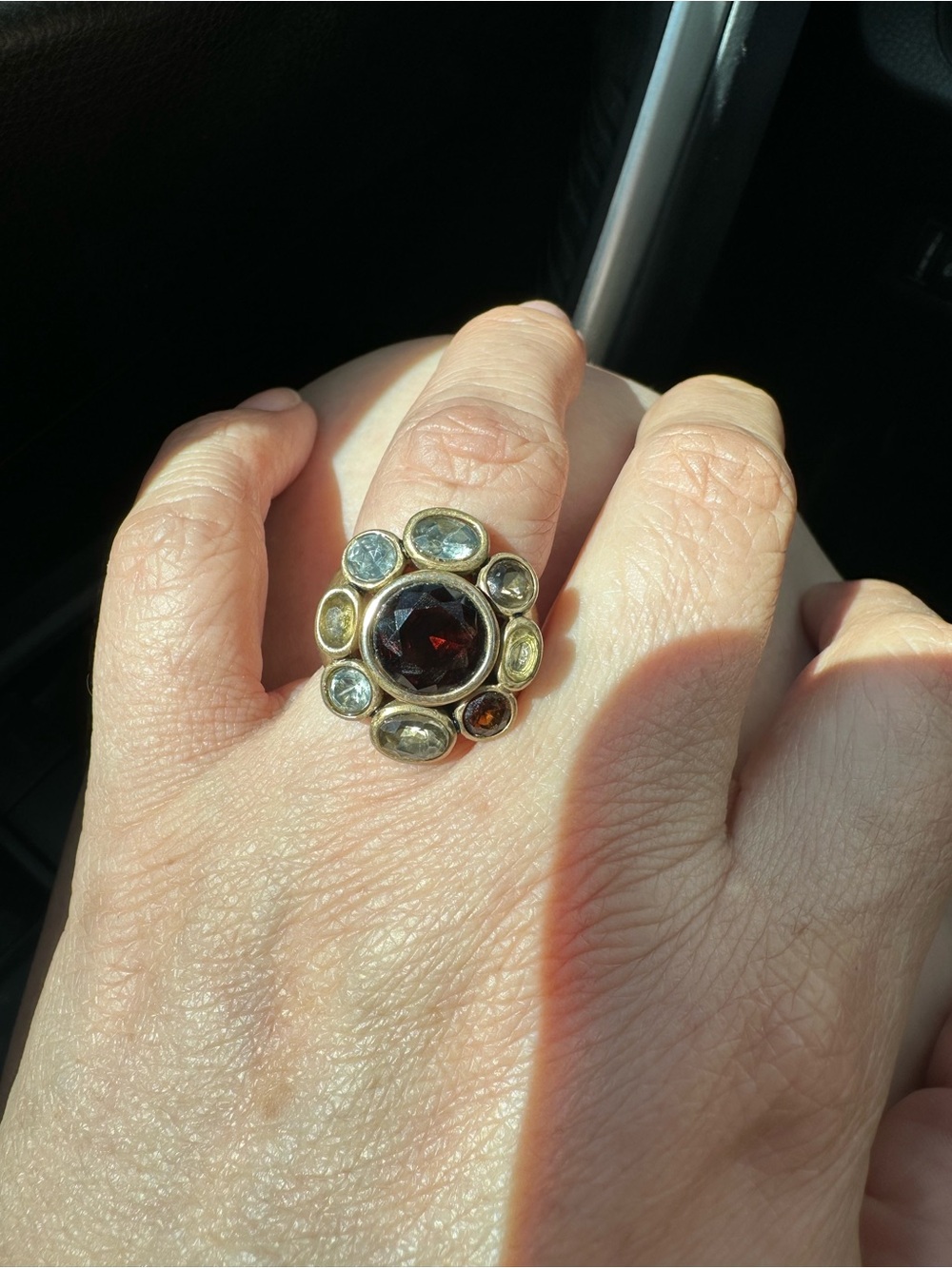 Fossil Gold-Tone Ring with Dark Red Center and Multi-Gem Accents